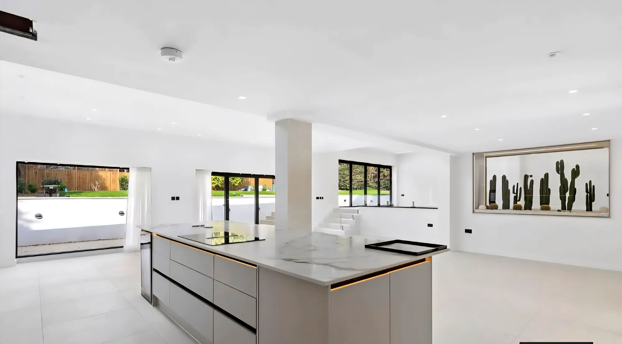 Kitchen island with an integrated hob