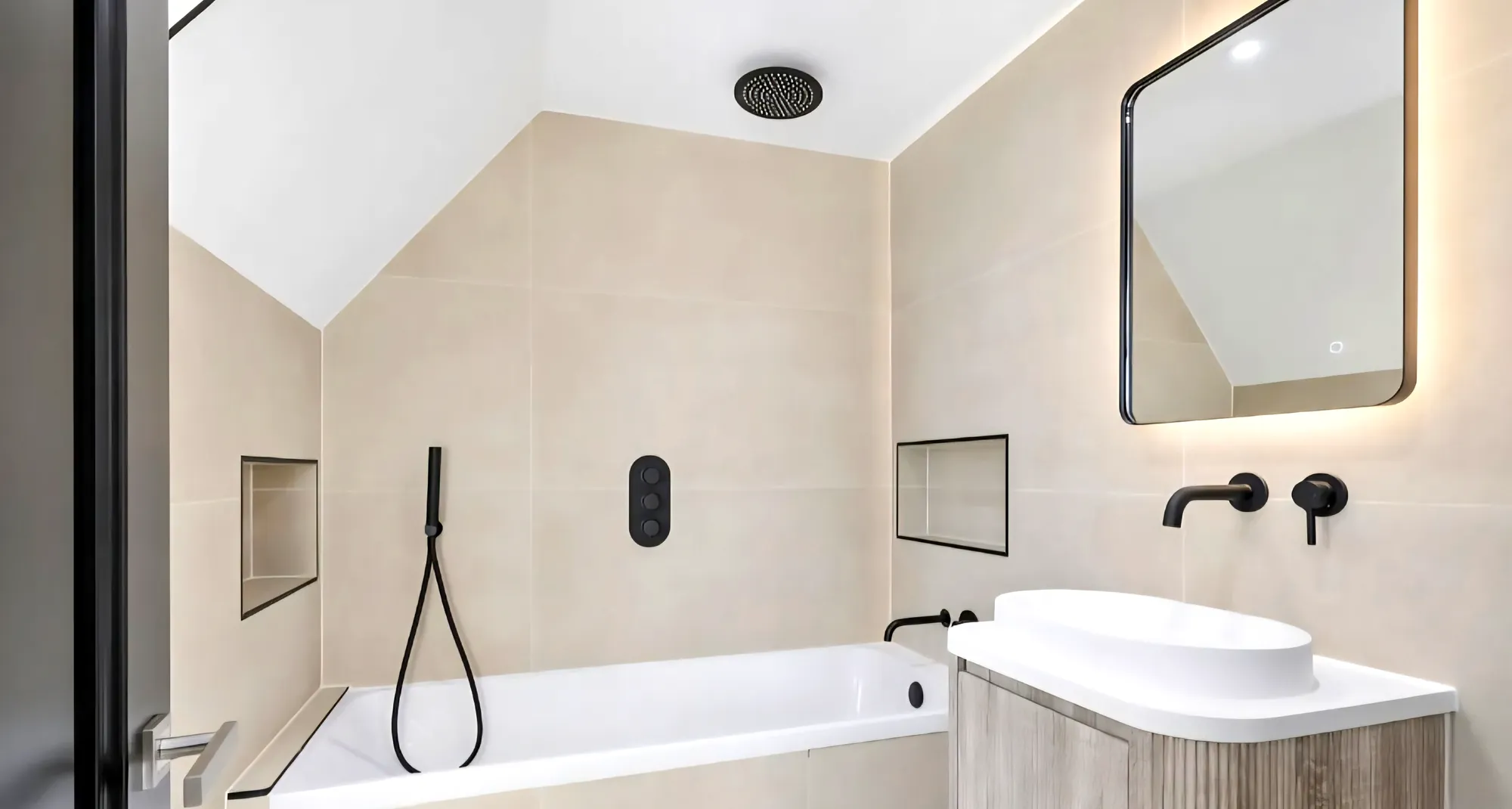 Bath with a rainfall shower and black fittings