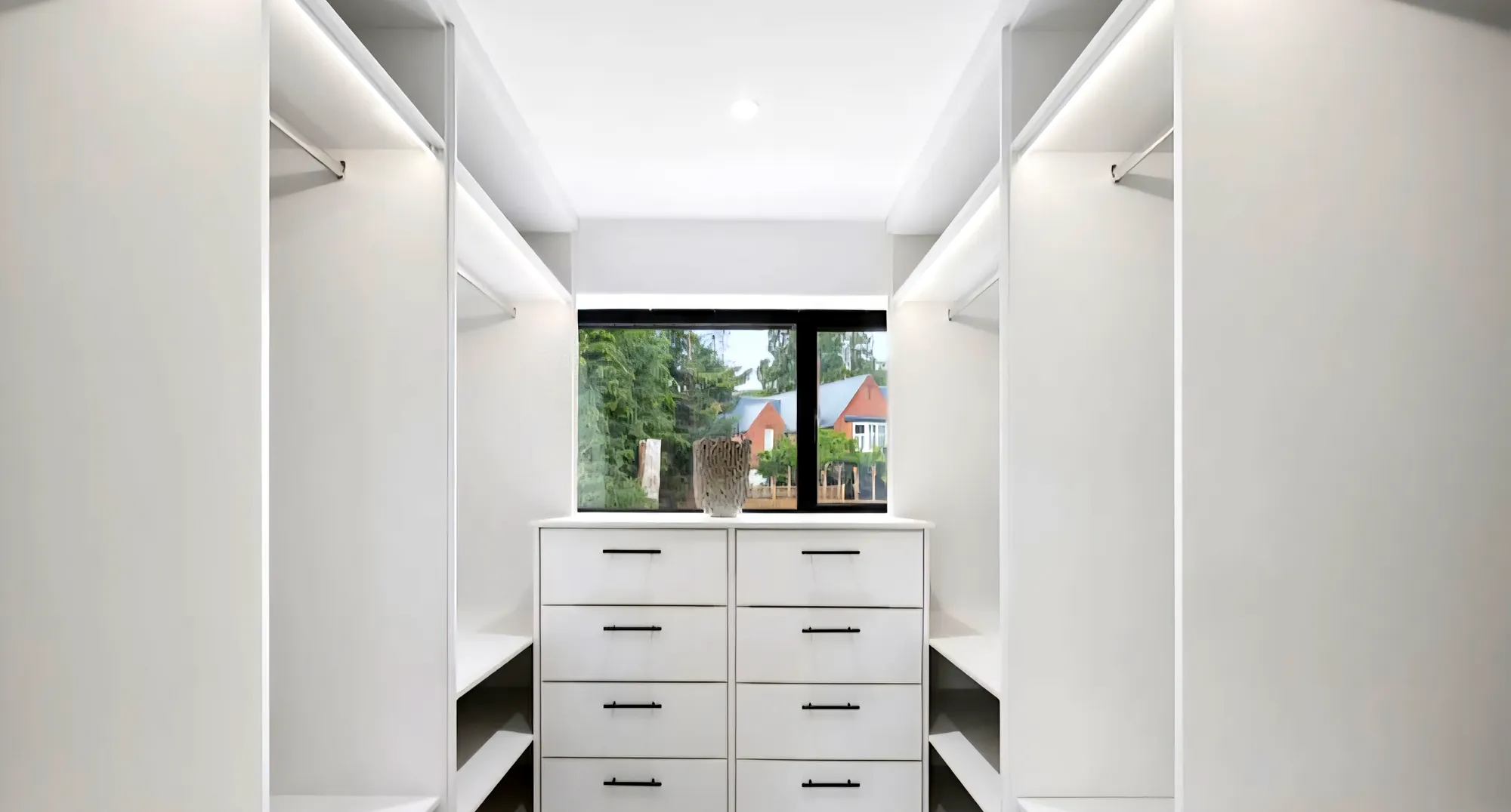 Dressing room with fitted wardrobes