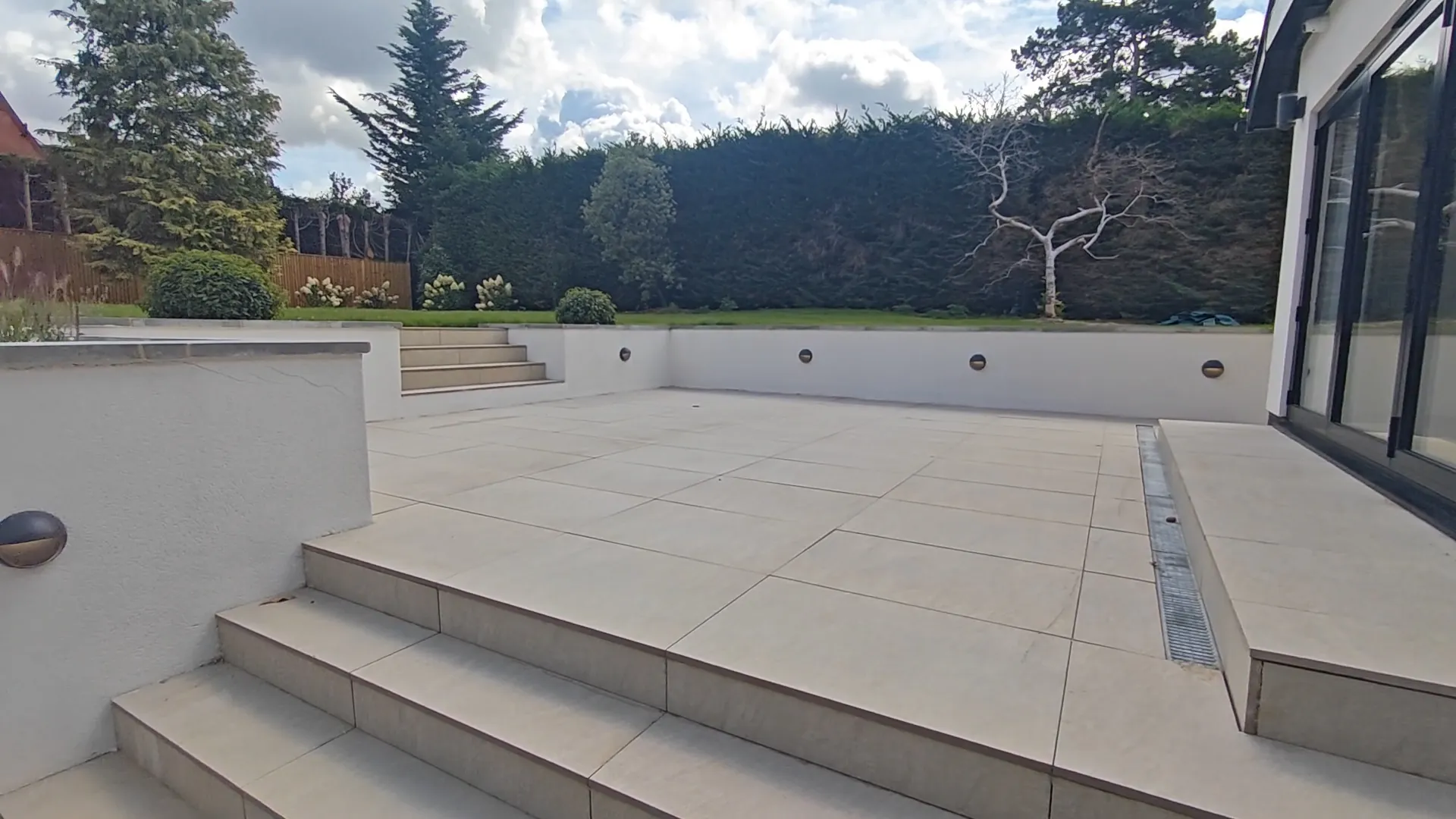 Steps from the terrace down to the garden