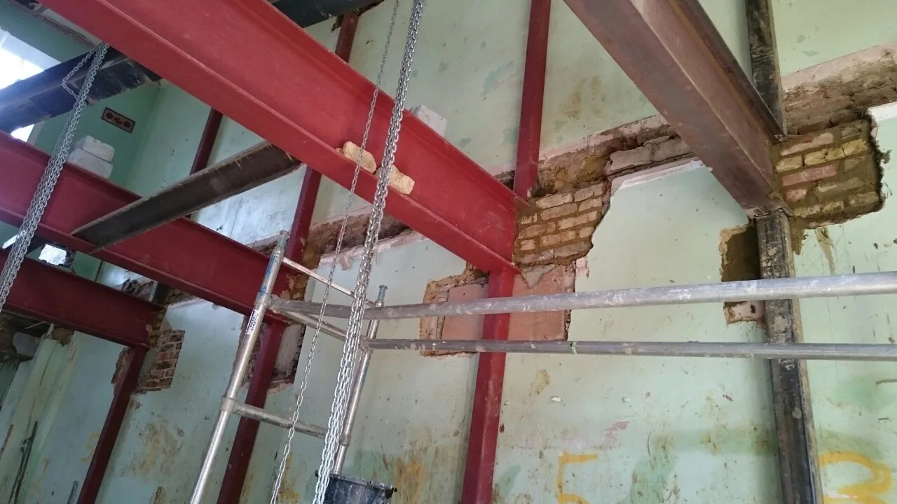 New steelwork going in against the old walls