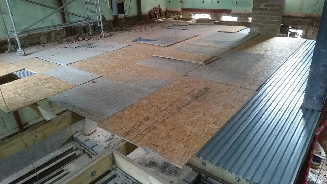Metal decking and boards for a new floor