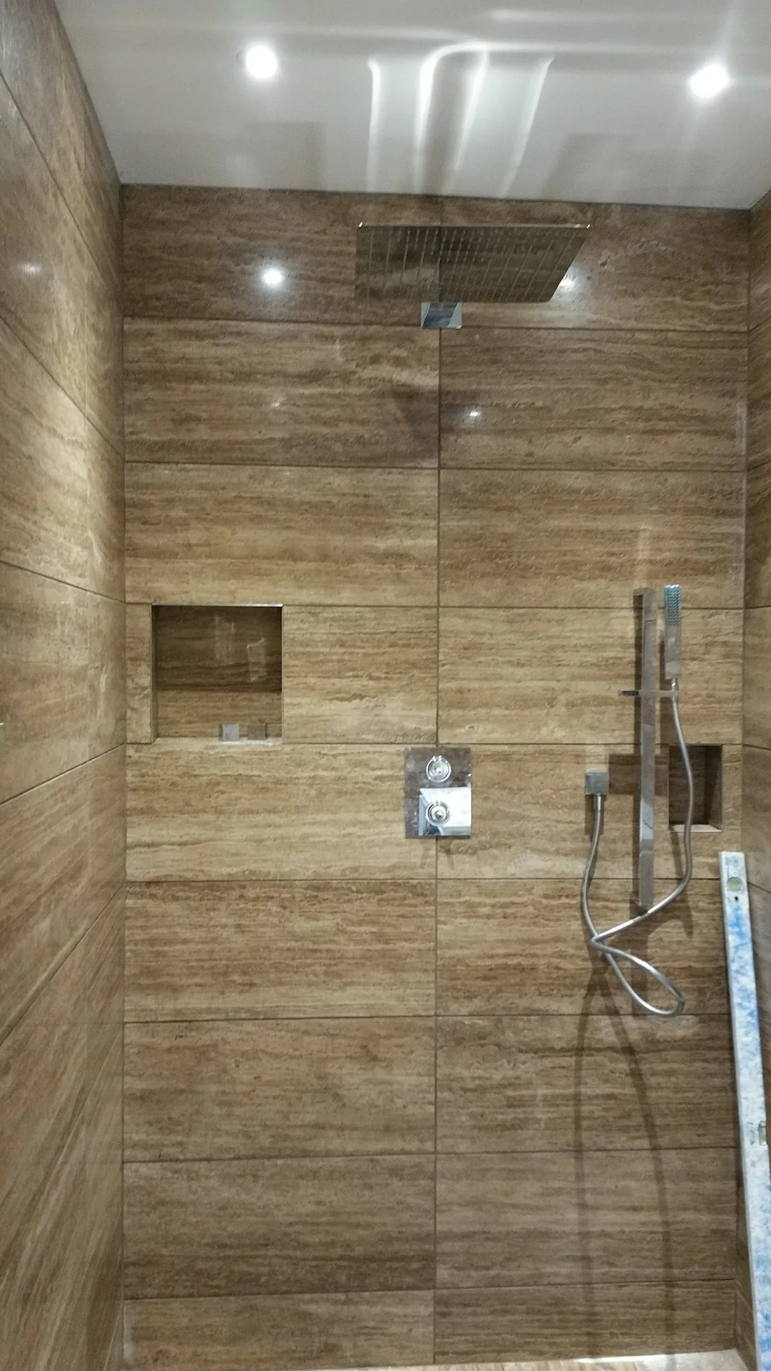 Travertine walk-in shower