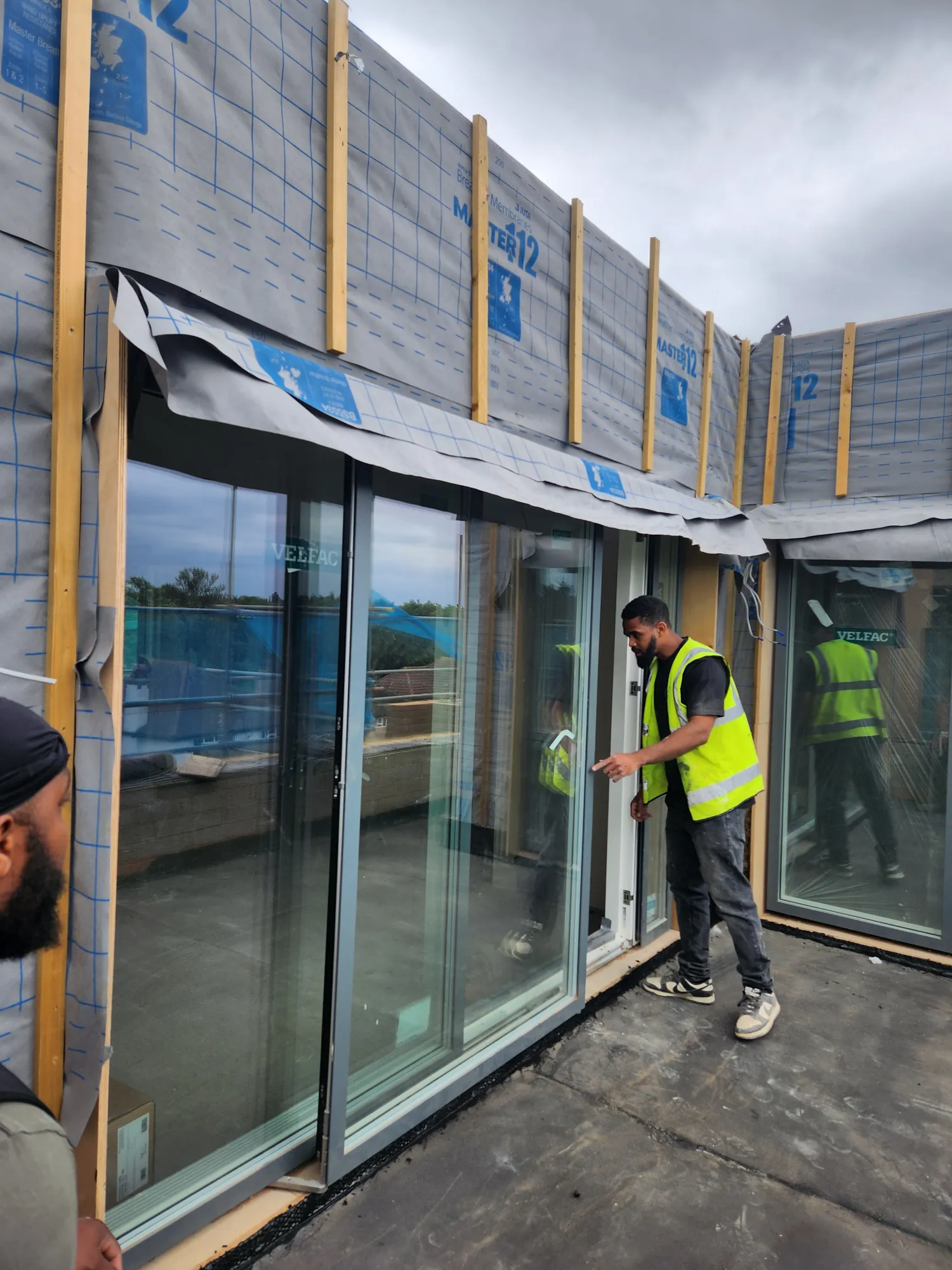 Fitting the balcony glazing