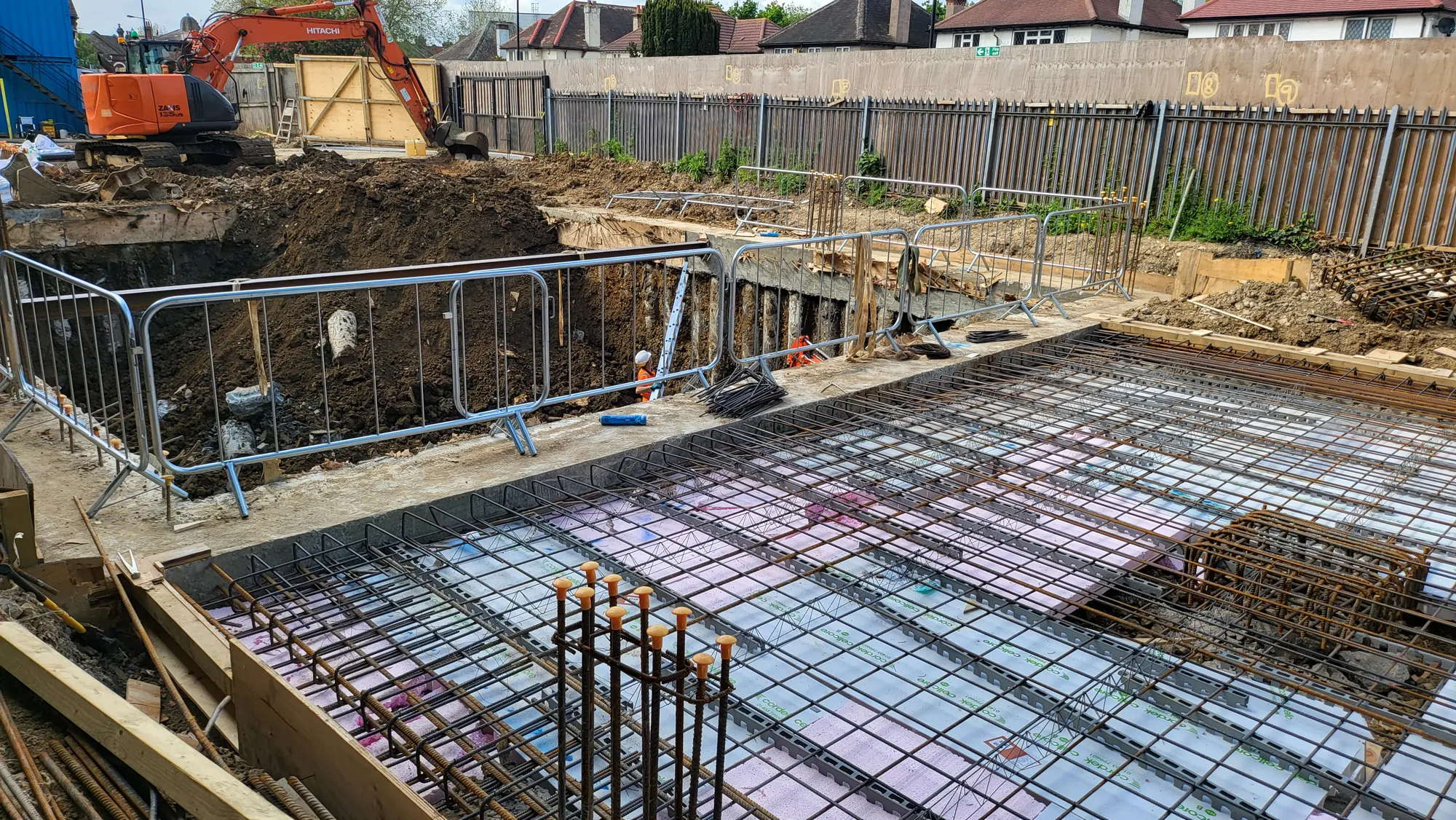 Slab reinforcement and starter bars beside the basement dig