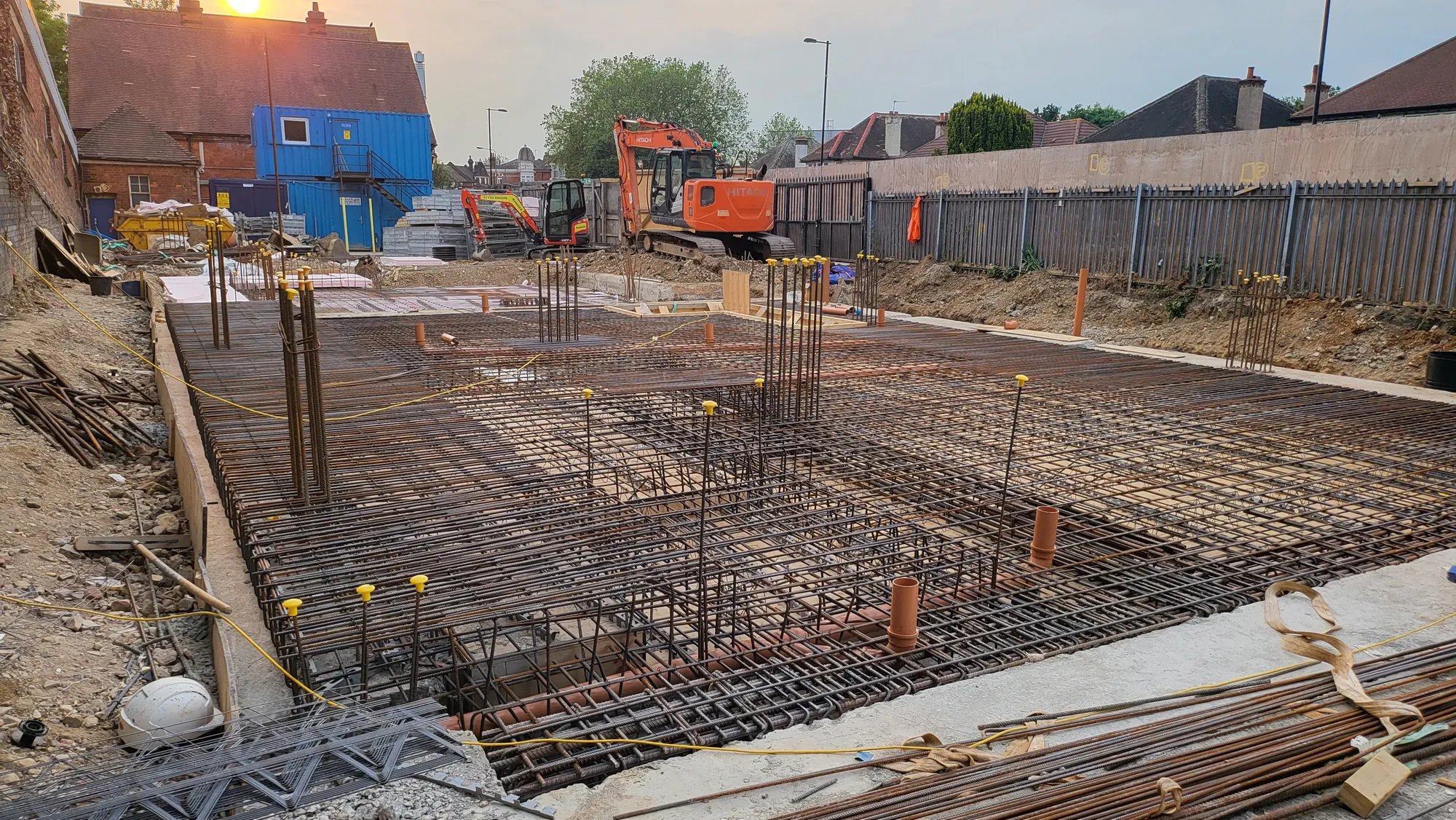 Slab reinforcement with the starter bars and drainage pipes in place