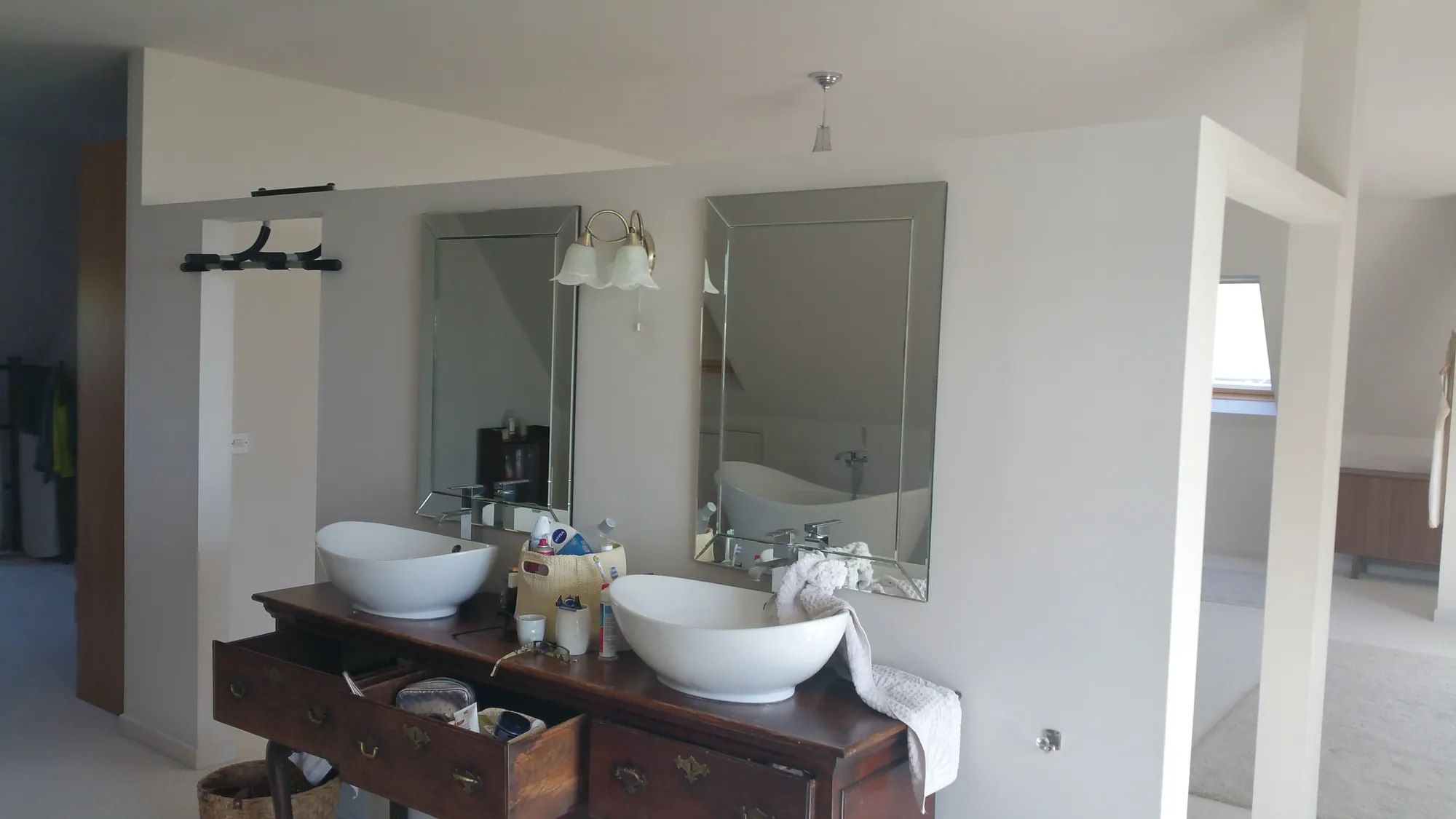 Bathroom with twin basins on a vanity unit