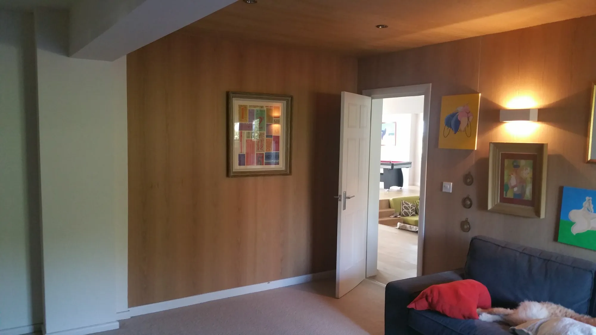 Timber-panelled wall in the sitting room