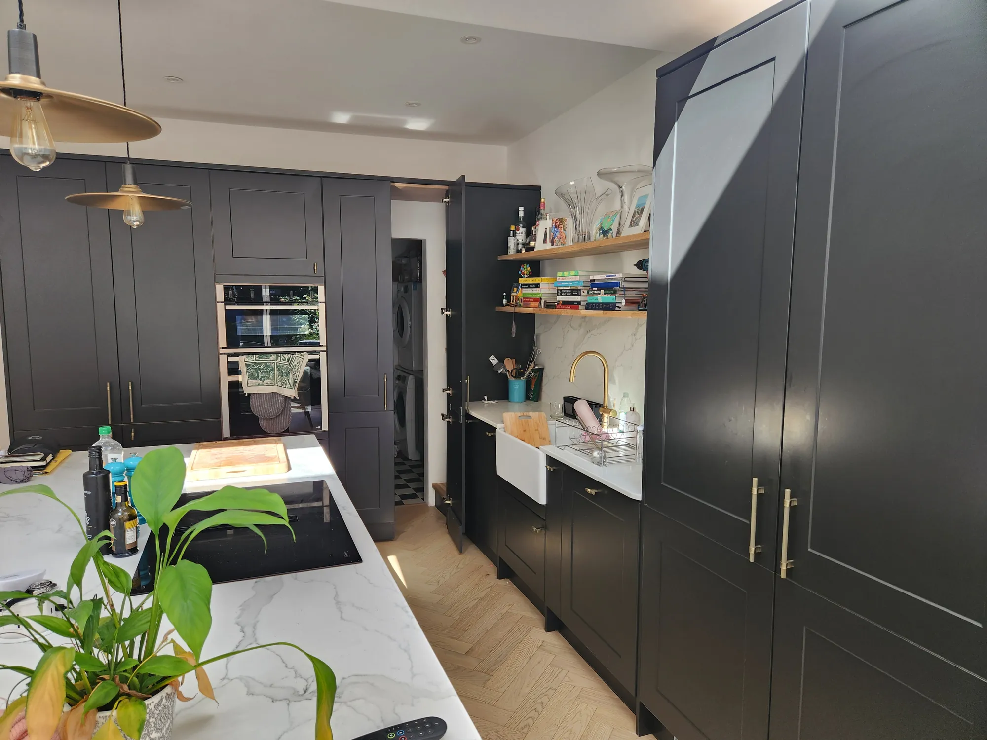 Navy shaker kitchen with tall units