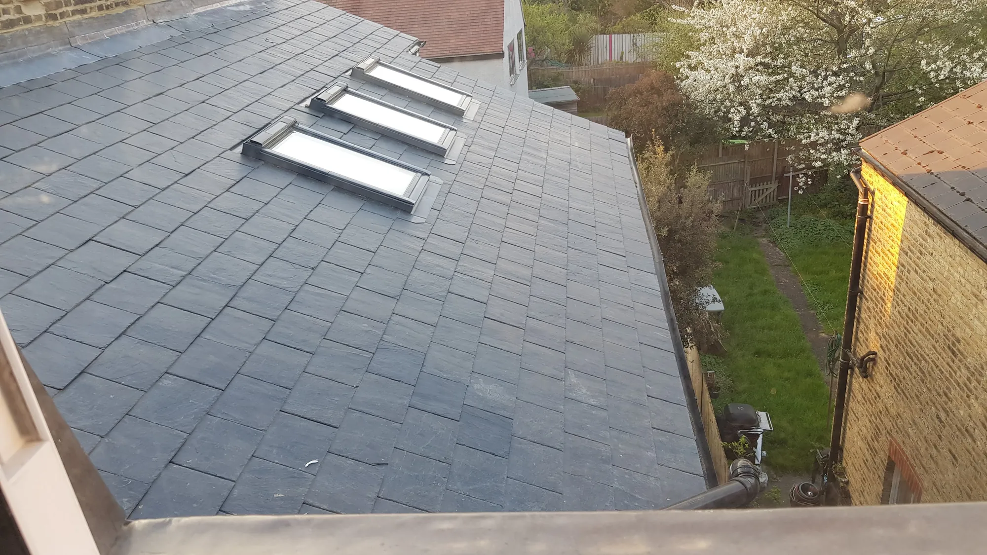 New slate roof with roof windows