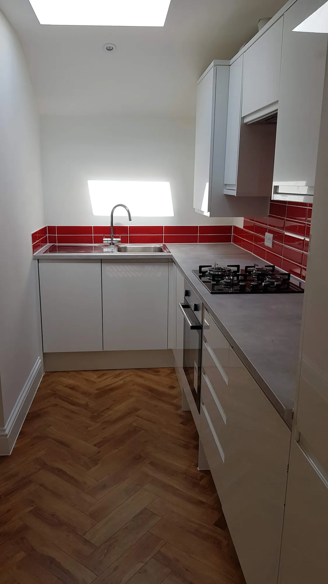 Galley kitchen in one of the new flats